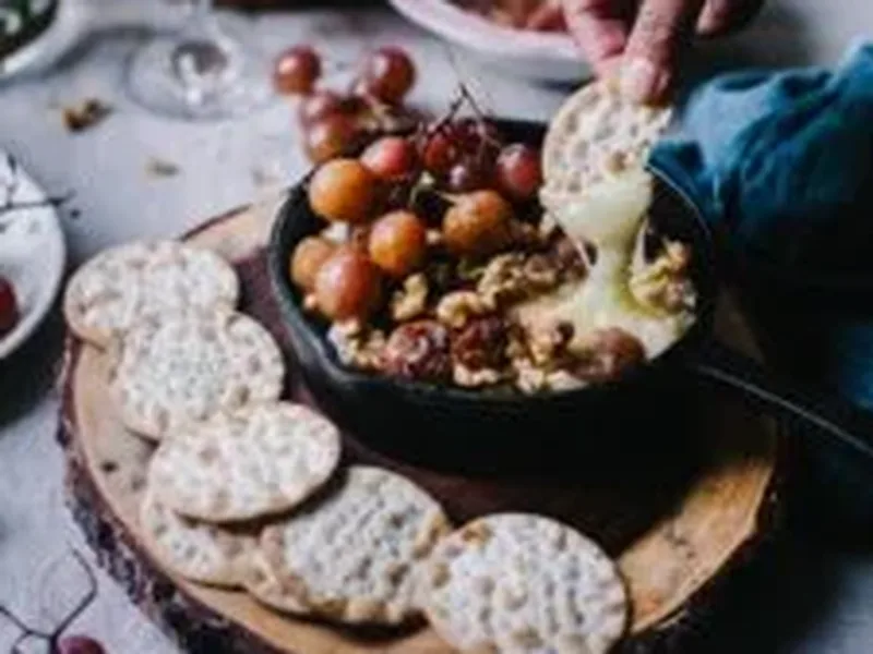 Baked Brie with Spiced Grape Chutney and Toasted Walnuts