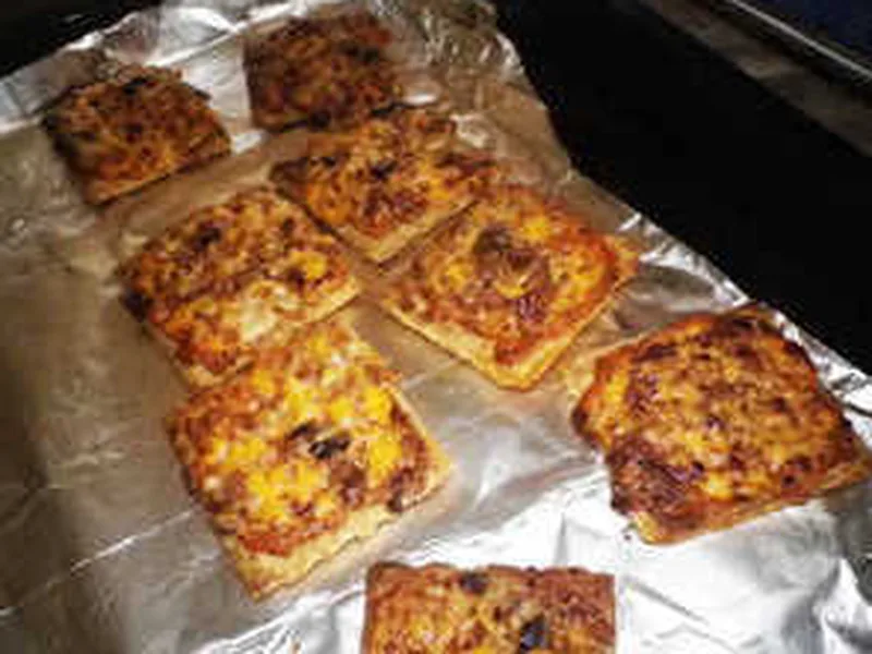 Baked Cheesy Olive Triscuit Bites