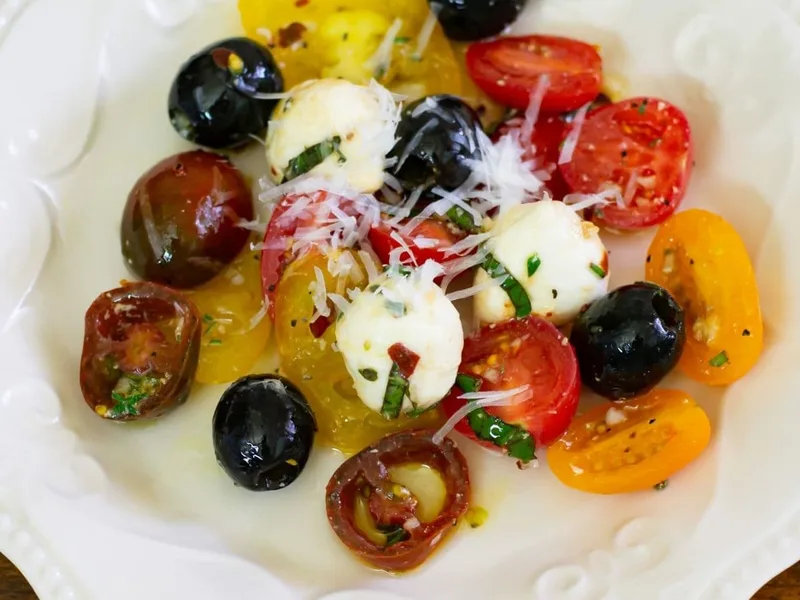 Tuscan Tomato Mozzarella Salad with Fresh Herbs and Olives