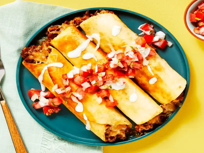 Crispy Beef Flautas with Pico de Gallo and Lime Crema