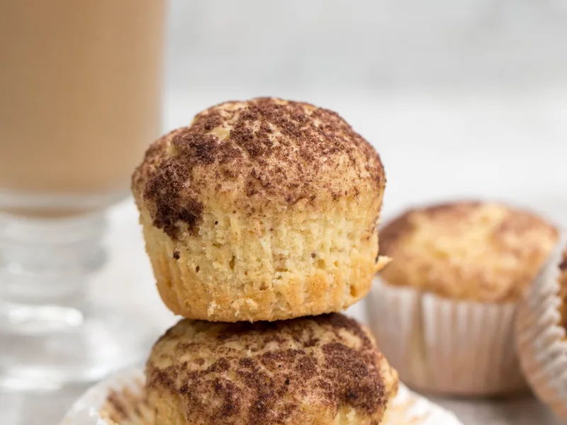 Peanut-Speckled Vanilla Orange Muffins with Cocoa Topping