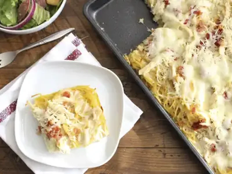 Creamy White Spaghetti Pizza Bake with Chicken and Bacon