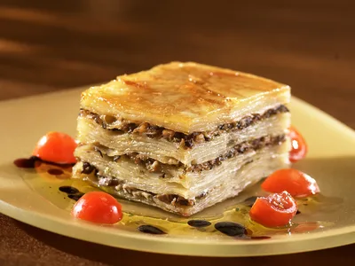 Wild Mushroom Idaho Potato Pave with Tomato Coulis