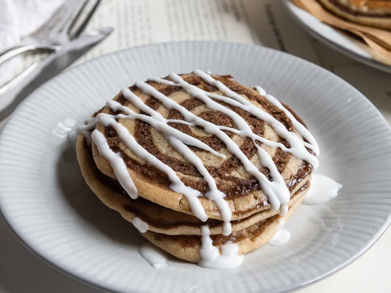 Cinnamon Roll Swirl Pancakes with Sweet Glaze
