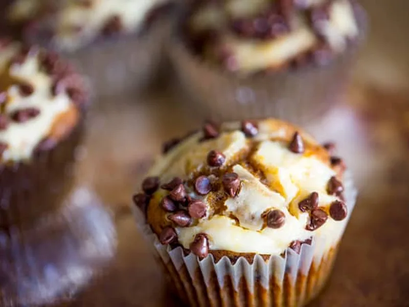 Chocolate Chip Pumpkin Cream Cheese Swirl Muffins