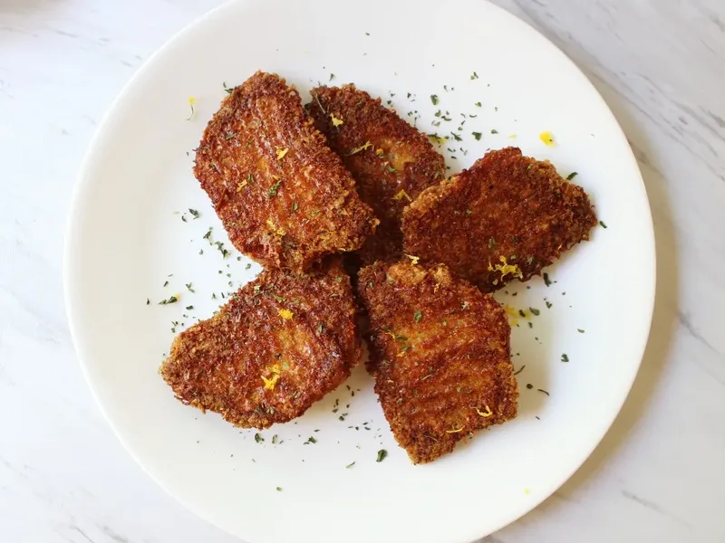 Crispy Pork Rind Crusted Baked Pork Chops with Parmesan