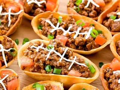 BBQ Beef Taco Football Boats with Sour Cream Laces