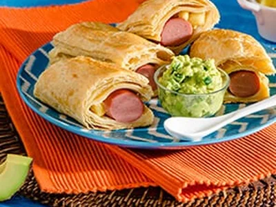 Pineapple Hotdog Crescent Wraps with Spicy Avocado Dip