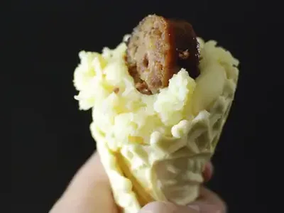 Beer-Glazed Sausage and Potato Cones with Pizzelle Shells