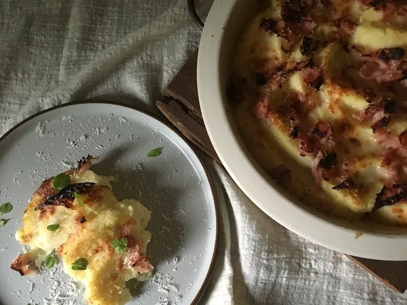 Baked Semolina Gnocchi with Cheese and Butter