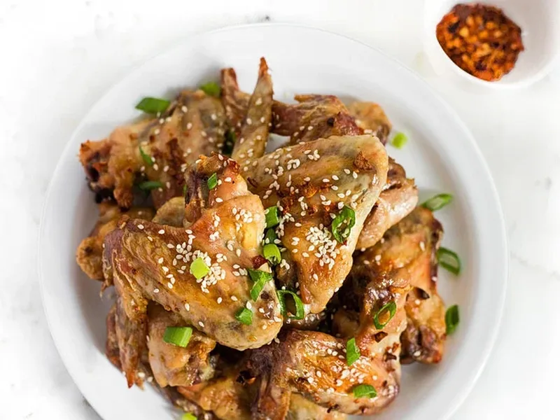 Garlic-Tossed Baked Chicken Wings with Sesame Oil