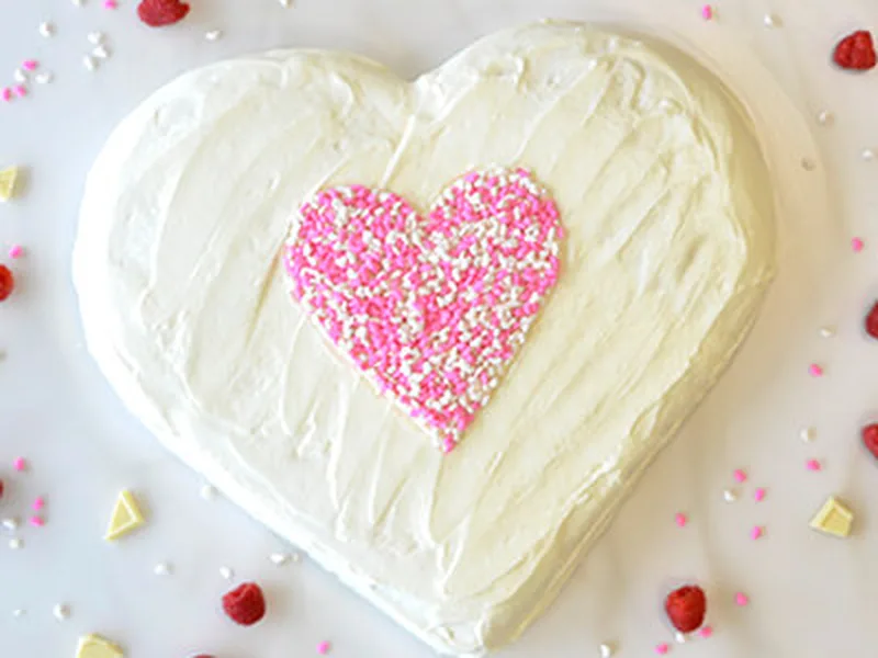 Raspberry-Filled Heart Cake with White Chocolate Frosting