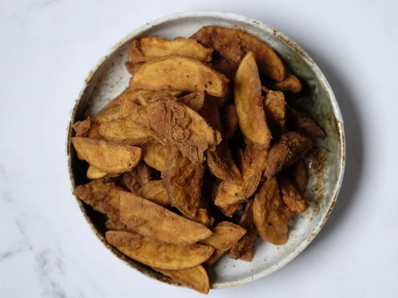 Crispy Fried Potato Wedges with Seasoned Flour Coating