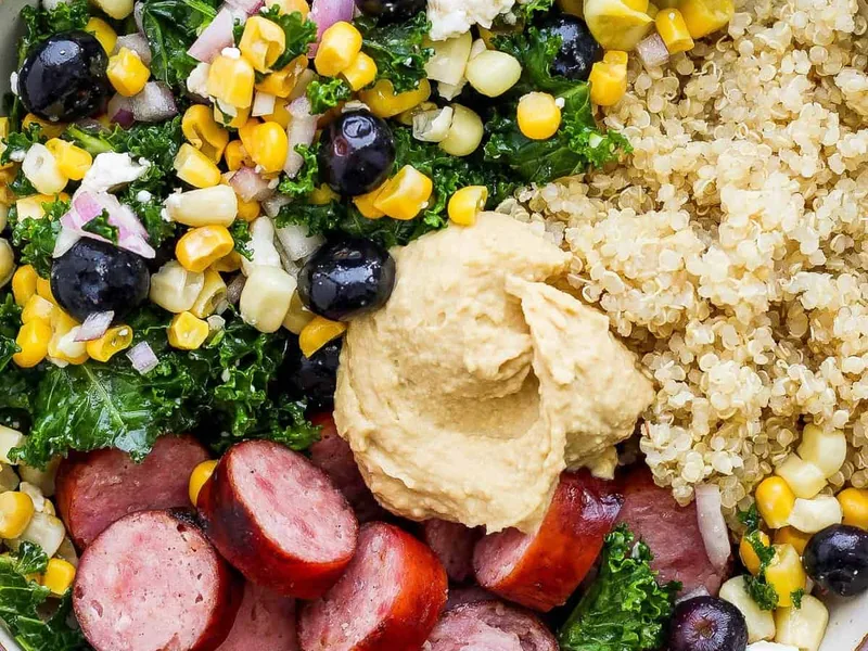 Quinoa Kale Bowl with Grilled Sausage and Blueberries