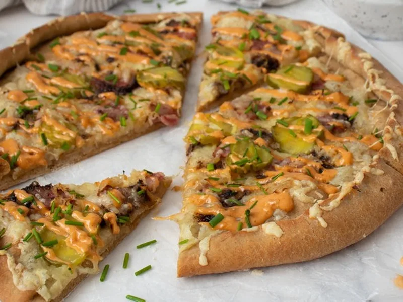 Pastrami Reuben Pizza with Swiss Cheese and Russian Dressing