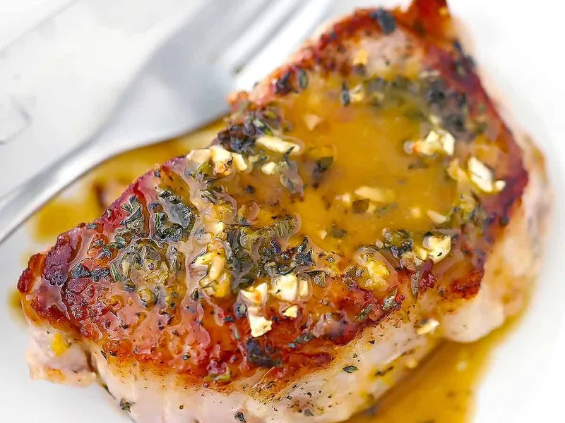 Garlic Herb Oven-Baked Pork Chops with Lemon