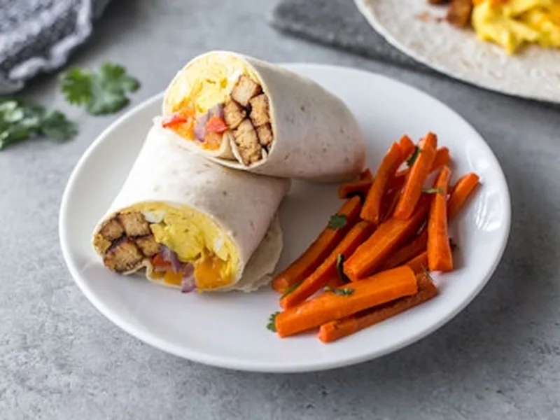 Savory Tempeh Breakfast Burrito with Spiced Carrot Fries