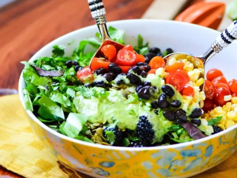 Mexican Black Bean Berry Salad with Avocado Lime Dressing