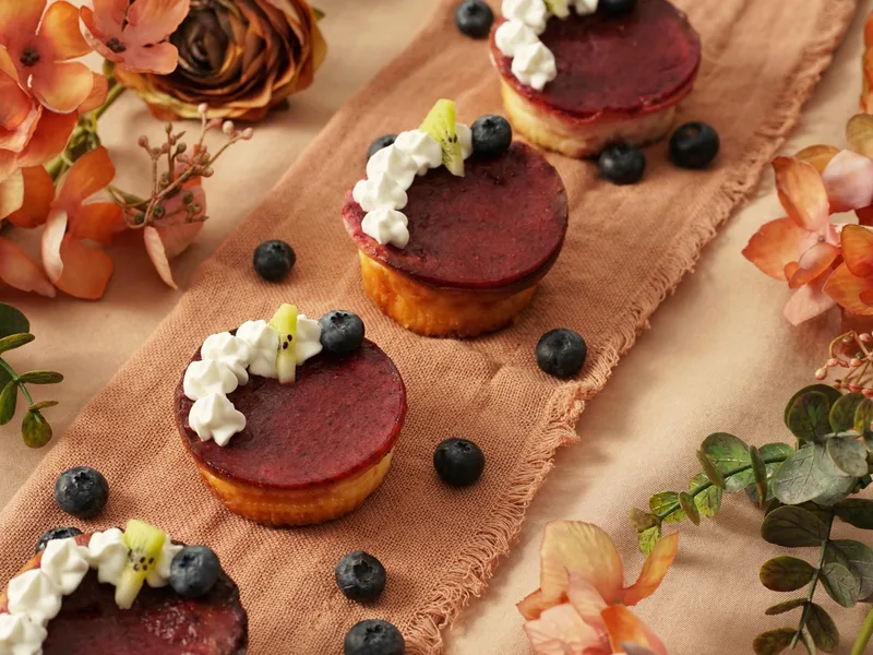 Mini Cheesecakes with Cornflake Crust and Berry Sauce