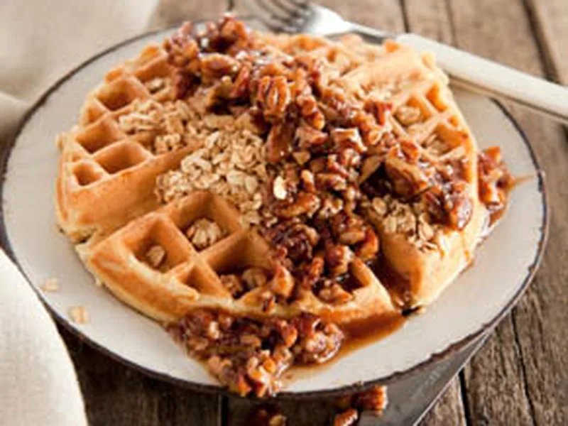 Granola Waffles with Buttered Pecan Maple Syrup