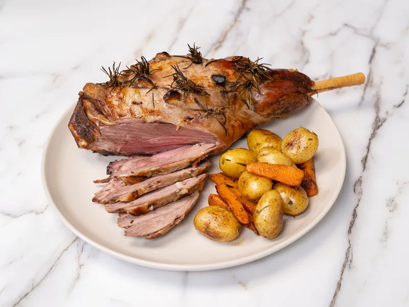 Pink Roasted Lamb Leg with Rosemary and Roasted Vegetables