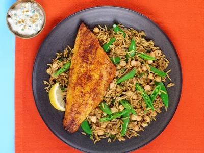Pan-Fried Sea Bass with Saag Aloo Chickpea Rice