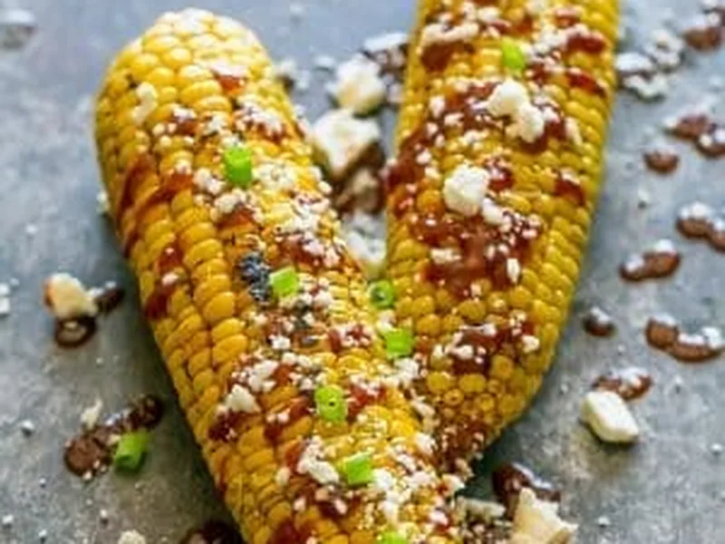Sriracha Cheese Grilled Corn with Cotija and Garlic Butter