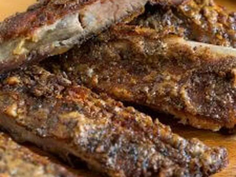 Slow-Grilled Baby Back Ribs with White Barbecue Sauce